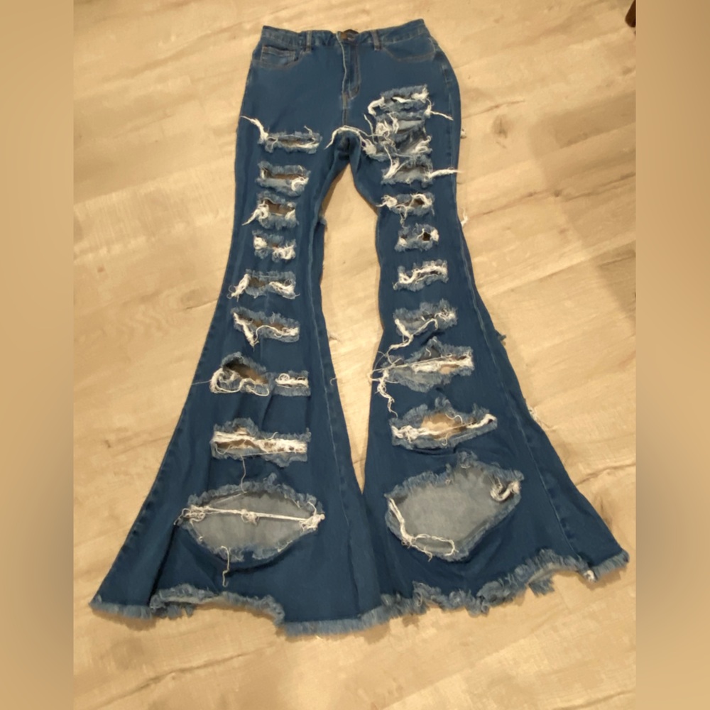 Purple candy extremely distressed women’s flare jeans size L. Halloween hippie